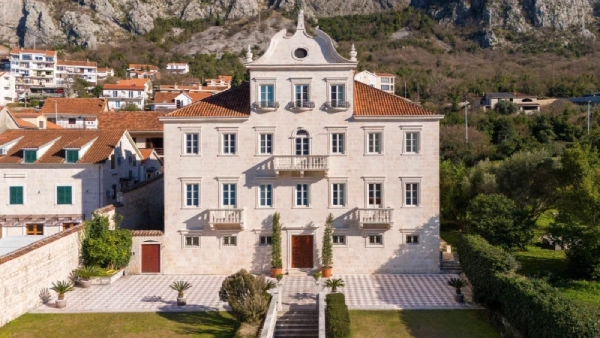 Baroque palace near Kotor on the Bay of Kotor coast, sunlit and built in white marble
